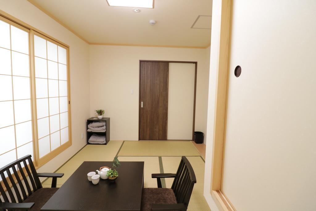 Отель Sakura Japanese House Осака Экстерьер фото